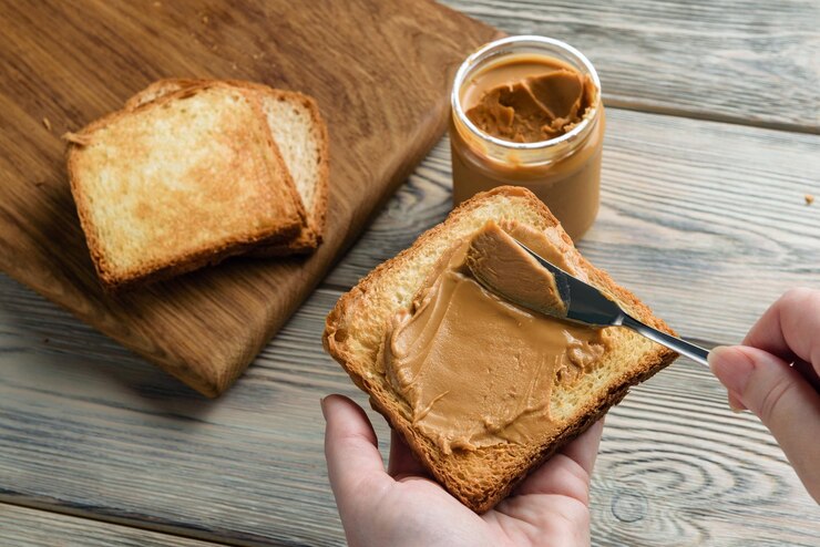 spread peanut butter toast