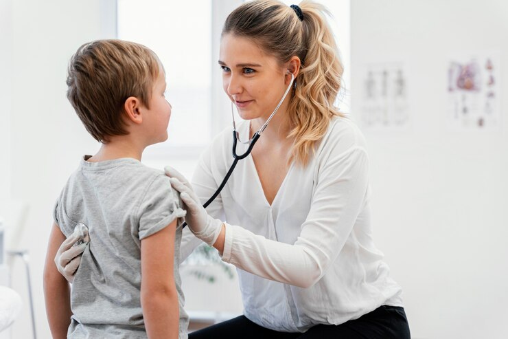 doctor checking kid